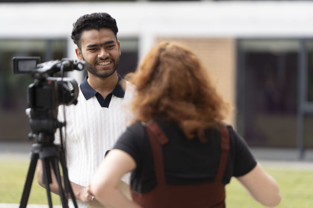 Ali Imran with a camera
